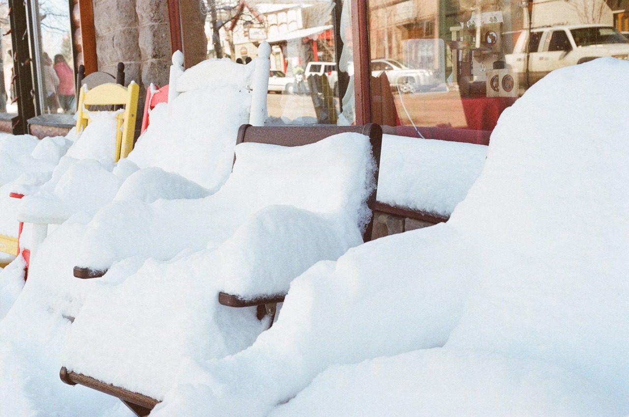 Snow covered chairs