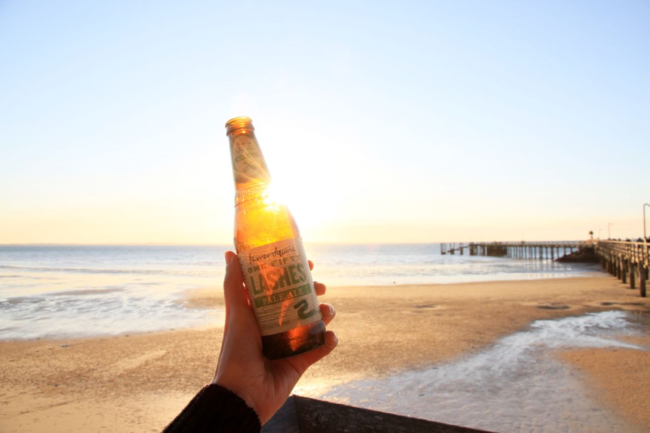 Tips for Staying Healthy while you travel Beer at sunset Fraser Island