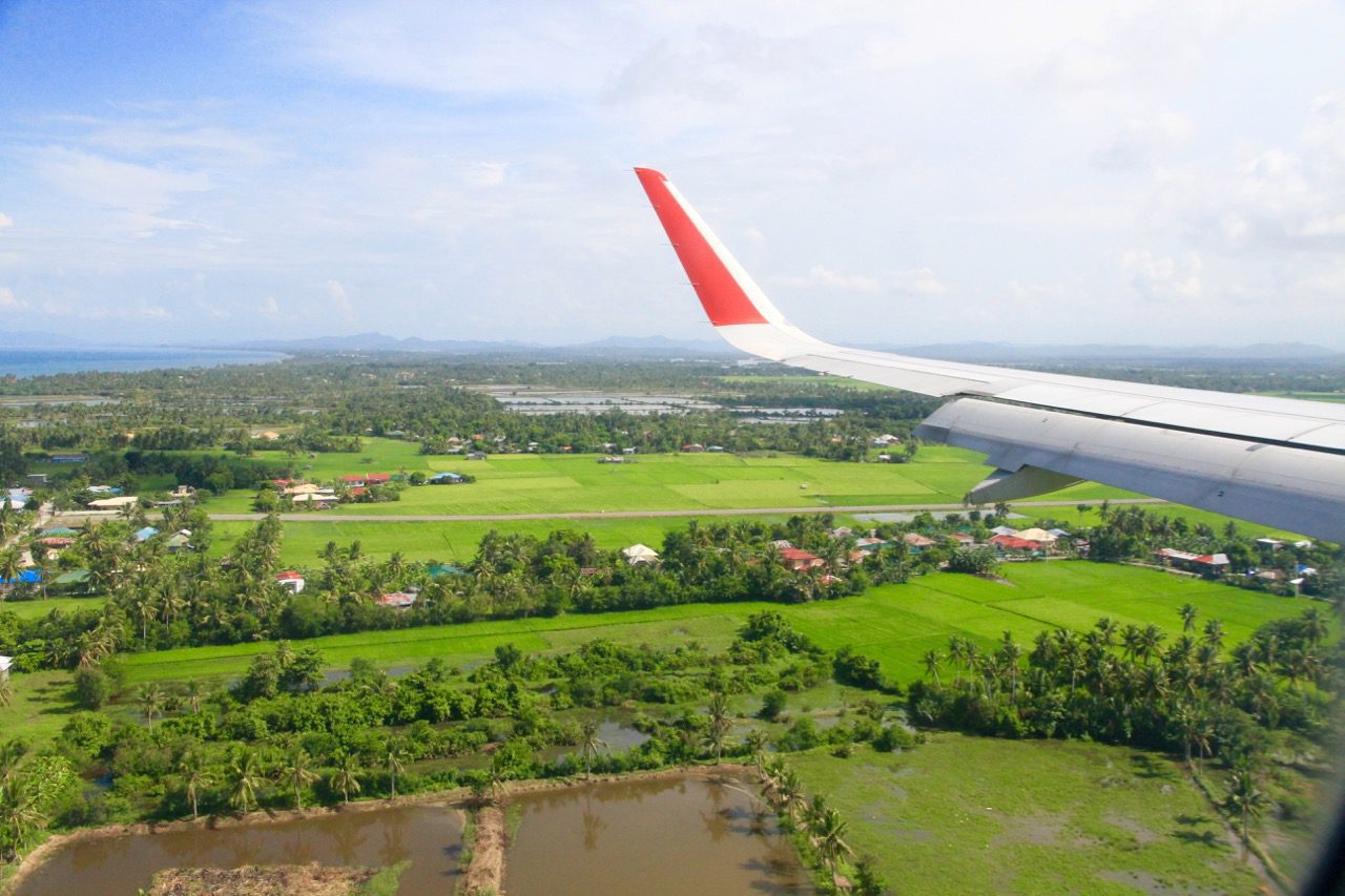 Flying from Kuala Lumpur to Kalibo Boracay Philippines landing at airport airasia