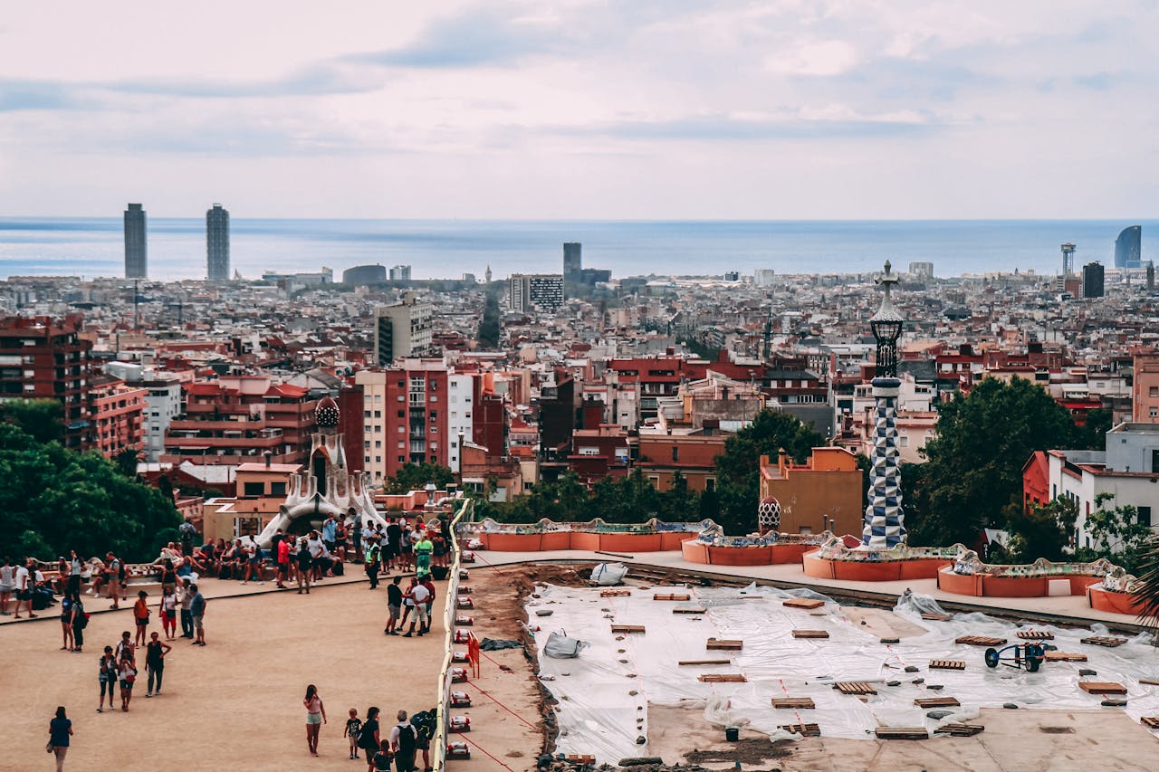 Discover Barcelona's vibrant cityscape from a scenic lookout, capturing its iconic architecture and lively atmosphere.